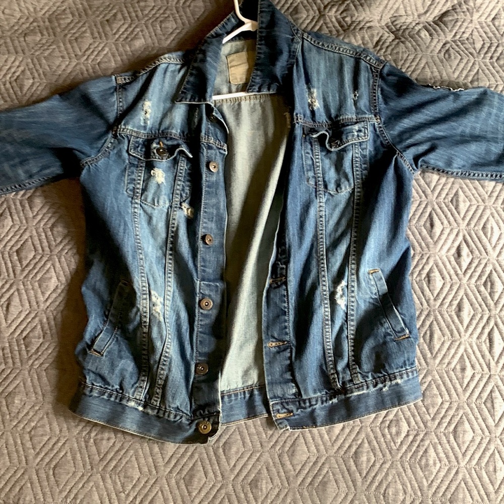 Denim jacket, Not sure what the brand is, color is blue, and size XL